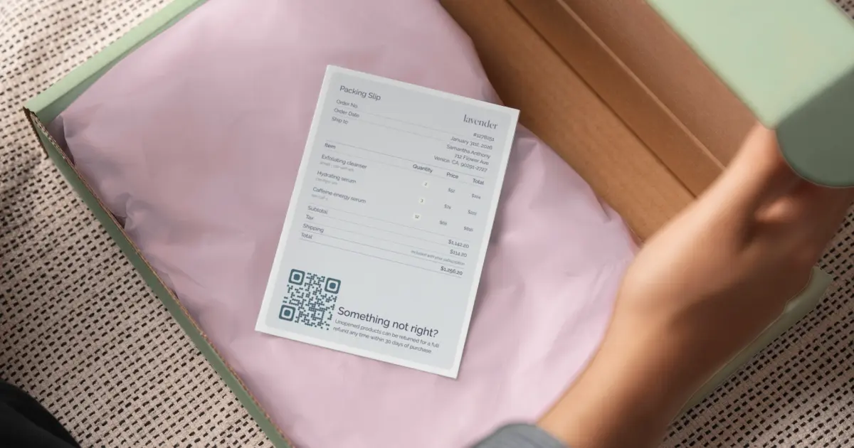 Package insert card with QR code inside a shipping box